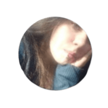 Circular portrait of a young woman with long hair leaning her head on her hand against a black background.