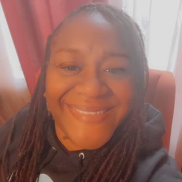 a woman with long hair and a black shirt