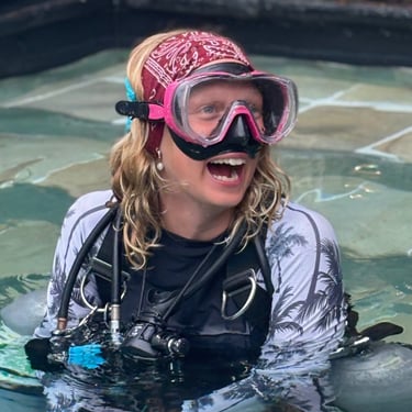 Smiling scuba diver in Gili Trawangan, enjoying personalized dive training with Gili Scuba Diving.