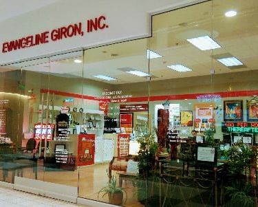 Elegant Glass Walls: Evangeline Giron, Inc. Office