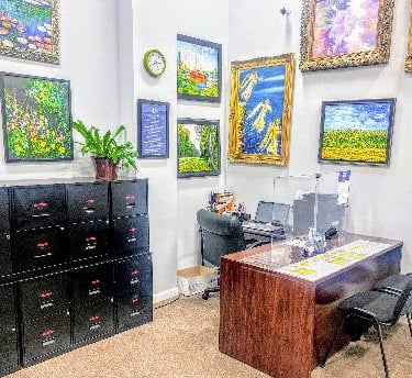 Artistic Touch: Paintings Throughout Evangeline Giron, Inc. Office"