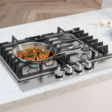 Kitchen stove with food cooking, showcasing a modern cooking setup for meal preparation in home kitchens