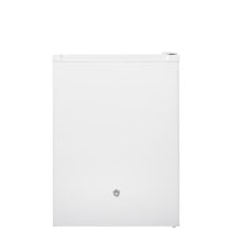 A compact, white mini-fridge with a small round handle near the bottom center of the door.