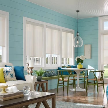 bright sunroom with white roller shades and coastal blue walls – Rise Up Window Coverings Milwaukee