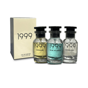 1999 perfume bottles Exposure, Blue Atlantic, and Lockdown in elegant glass design beside a box.