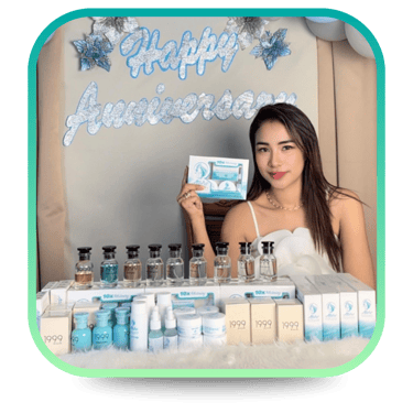 Table displayed with various skincare and fragrance products, alongside a "Happy Anniversary" sign.