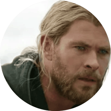 A headshot of a man with a concern look on his face.