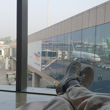 William Coste waiting at airport