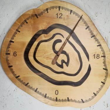 24-hour wood inlay clock in shape of logo