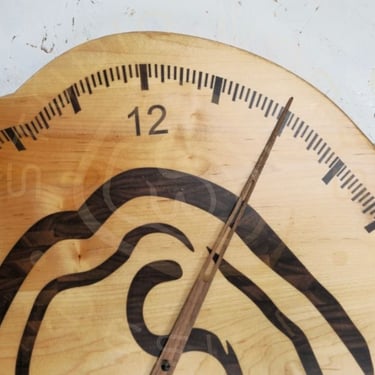24-hour wood inlay clock in shape of logo