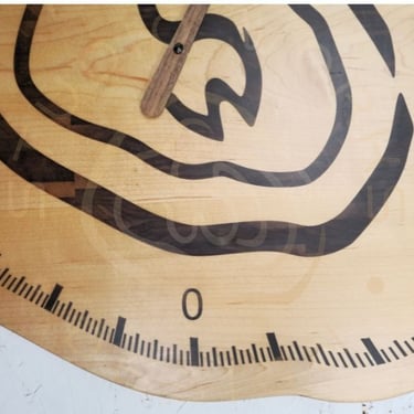 24-hour wood inlay clock in shape of logo