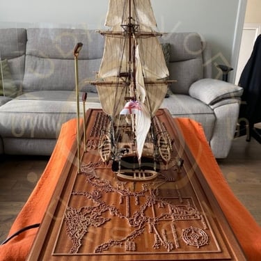 Display base for a model ship