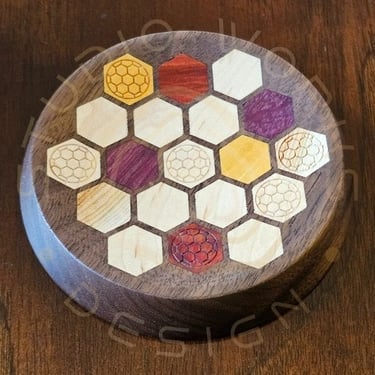 Round concave display holder with hexagonal exotic wood inlays