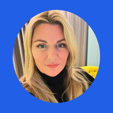 Claire is looking at the camera, with blonde hair and a black turtle neck top