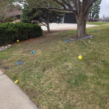 utilities marked in the front yard of home 