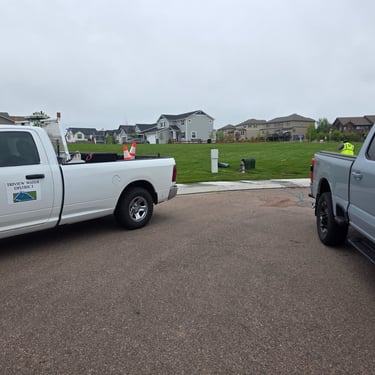 leak detection vehilces parked at a water vault in monument colorado