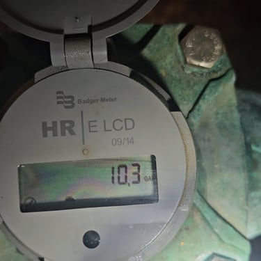 water meter showing 10 gallons per minute leak on a commercial property