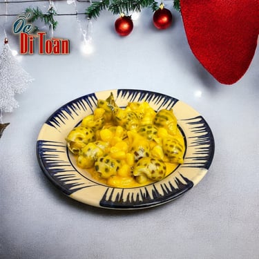 Ốc hương sốt trứng muối best seller tại Ốc Dì Toàn - quán ốc ngon Sài Gòn