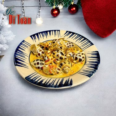 Ốc hương sốt bơ cay - món ngon tại Ốc Dì Toàn - Ốc ngon quân Bình Thạnh