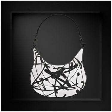 Designer white leather shoulder bag by Vymoyre with an abstract black splatter paint pattern.