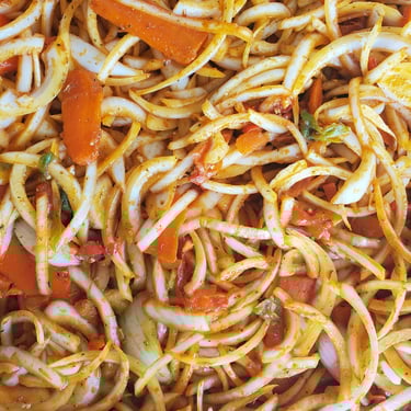 a large pan of pasta with pasta and cheese