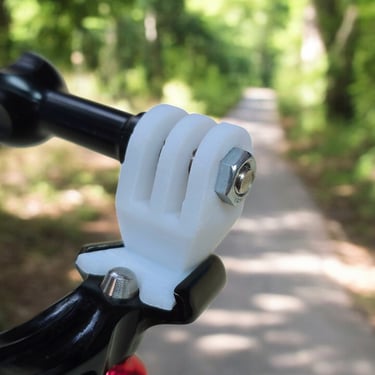 white single mount with gopro camera in woods