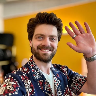 a man with a beard and a ring on his finger