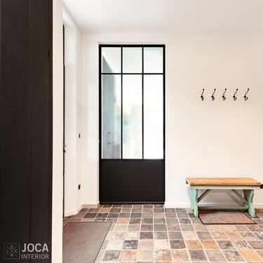 Schilderwerken van een inkom door Joca Interior