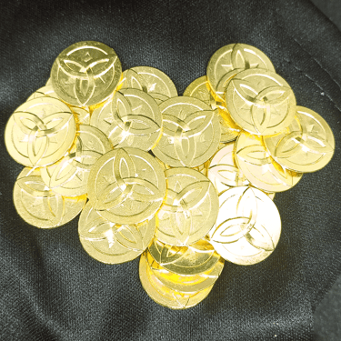 a pile of Nordic rune marked golden coins on a black background