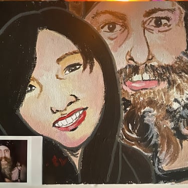 artwork with a polaroid photo in the bottom left corner