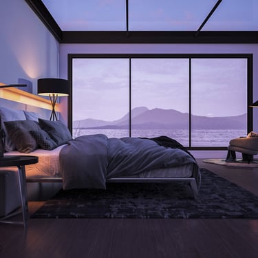 Modern bedroom with large bed, floor-to-ceiling windows, and view of lake and mountains.
