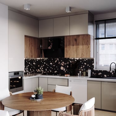 Modern kitchen with light grey and wood cabinets, black tile backsplash, built-in oven, gas stove, and round wooden table.