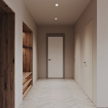 Modern minimalist hallway with wooden shelf, white door, elegant lighting, and unique patterned floor design.
