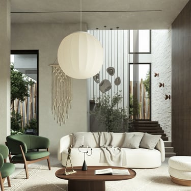 3D rendering of modern living room with white sofa, green chairs, round table, unique hanging lights, and natural light.