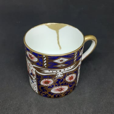 Mini coffee can after conservation with kintsugi style repair