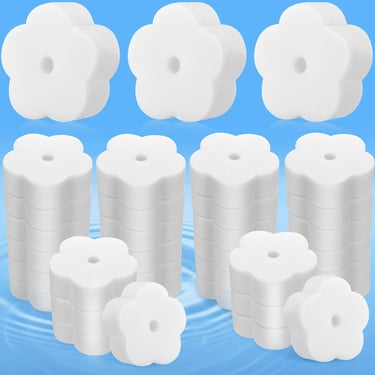 a bunch of white plastic containers with white plastic caps