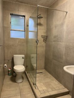 Shower and toilet bathroom area of Umdloti self catering holiday studio apartment