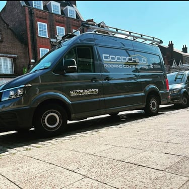 Goodchild Roofing branded vans