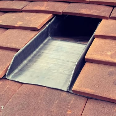 Custom made lead roof water outlet