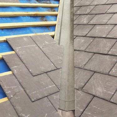 Slate roof installation complete with fibreglass bonding gutter