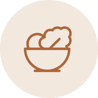 Ciotola di cibo con cucchiaio, simbolo di alimentazione equilibrata