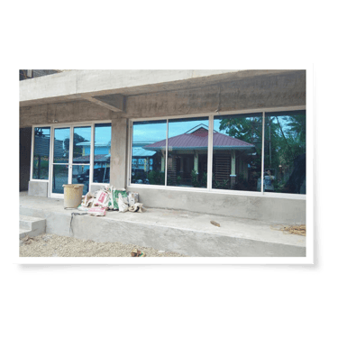 A newly installed window showcasing Meegan Glass and Aluminum Supply Service.