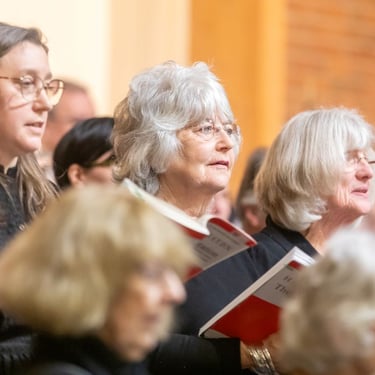 Combined choirs singing Haydn's Creation, Feb 2025