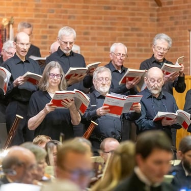 Combined choirs singing Haydn's Creation, Feb 2025