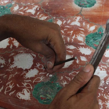 art of inlaying gems in marble