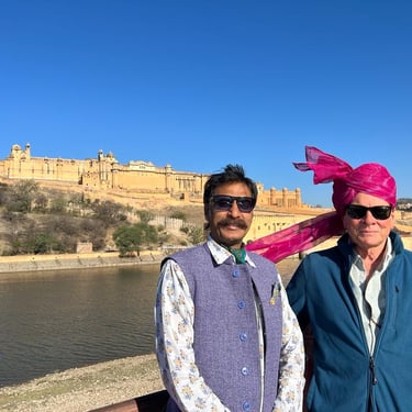 Our Rajasthan expert Guide Tony with his guest (to the right) at the Amber Fort of Jaipur