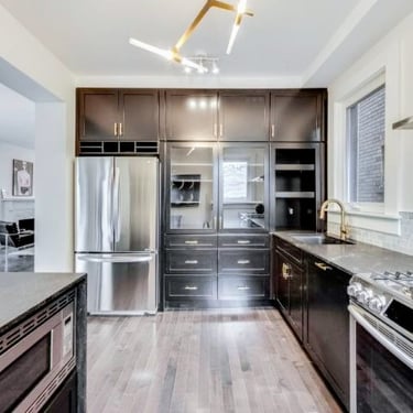 Open concept kitchen renovation with structural wall removal in High Park Toronto
