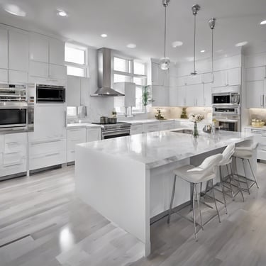 Newly renovated open-concept white kitchen in Toronto with modern lighting, white cabinets, and marble-style countertops.