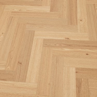 Close-up of elegant, light-colored wooden parquet flooring with a clean, seamless joint pattern