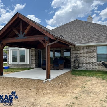 Brown Patio in front of Bricked House